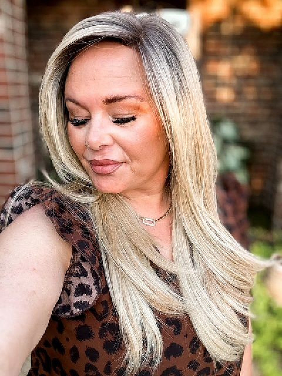 100% Human Hair Trendy blonde ombre with gold highlights Straight with side bangs Lace Part Wig